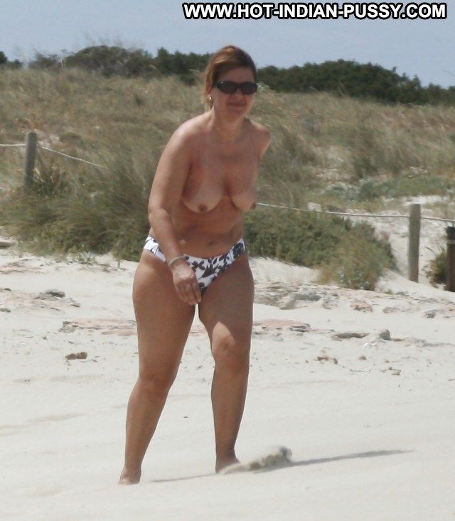 hairy big tit woman topless at beach