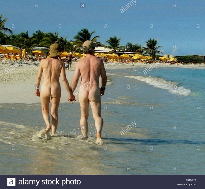 older naked couples on beach