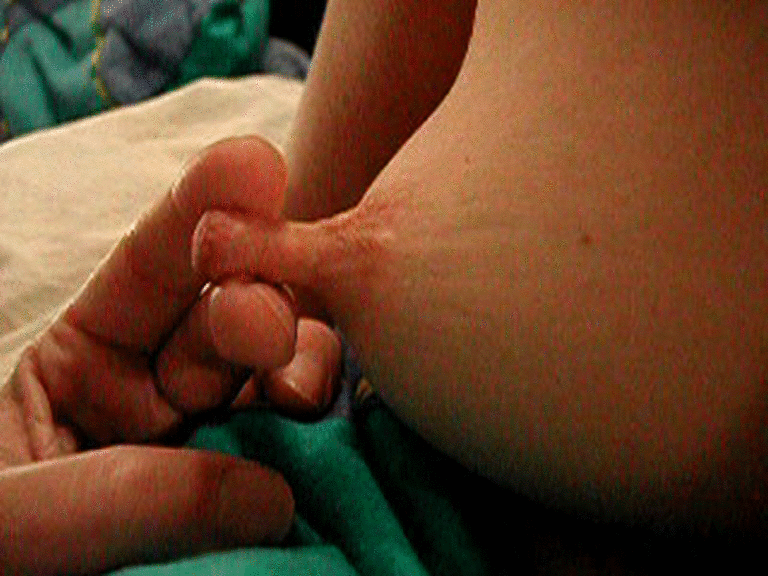 woman rubbing her nipples