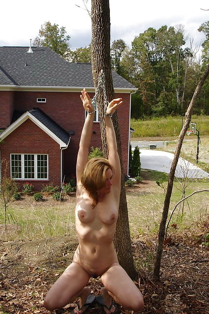 nude female outdoor bondage