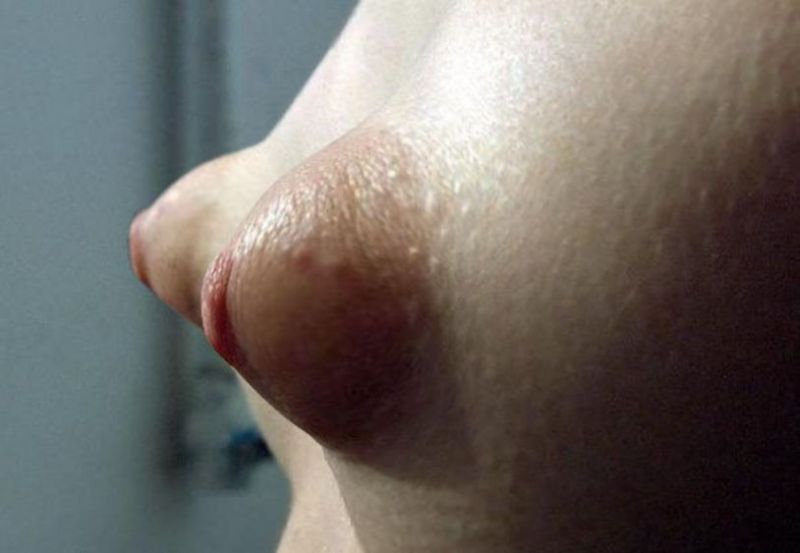 oiled tits close up