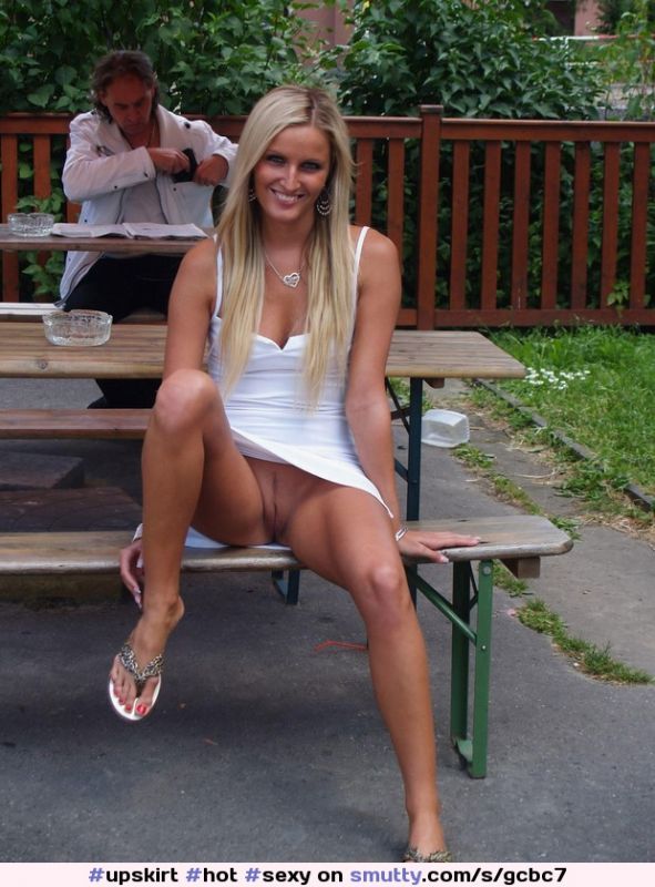 mini skirt laying on park bench