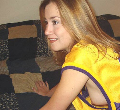 side view of a girl wearing a tank top