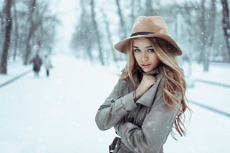snow girl with brown hair blue eyes