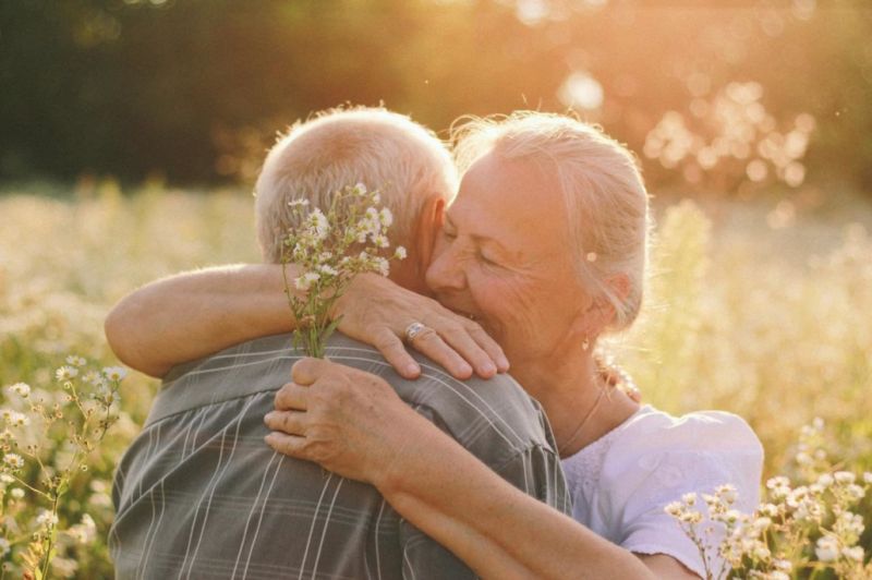 someone helping an elderly person