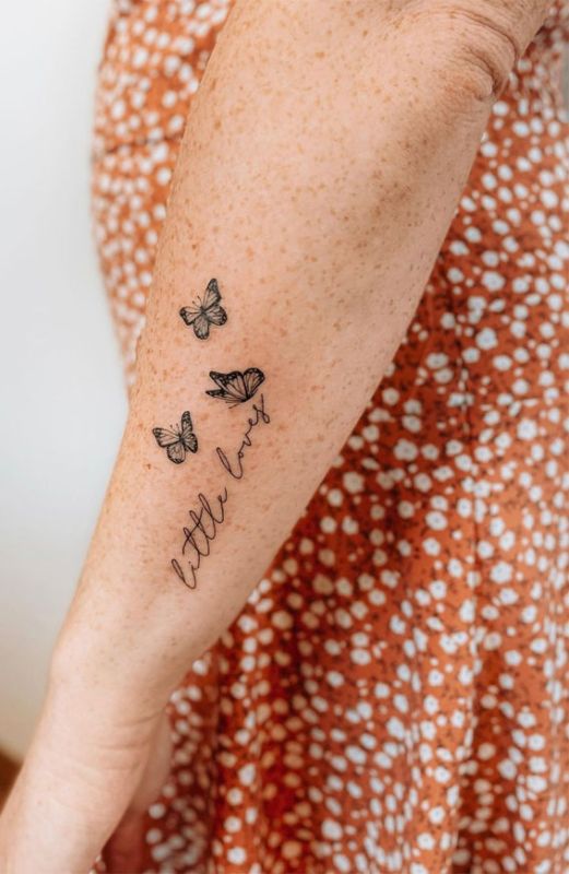 pluma tattoo