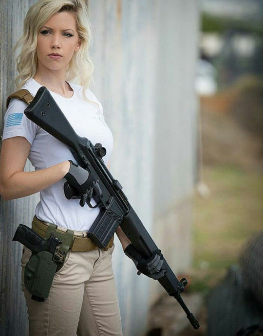 women warriors with guns