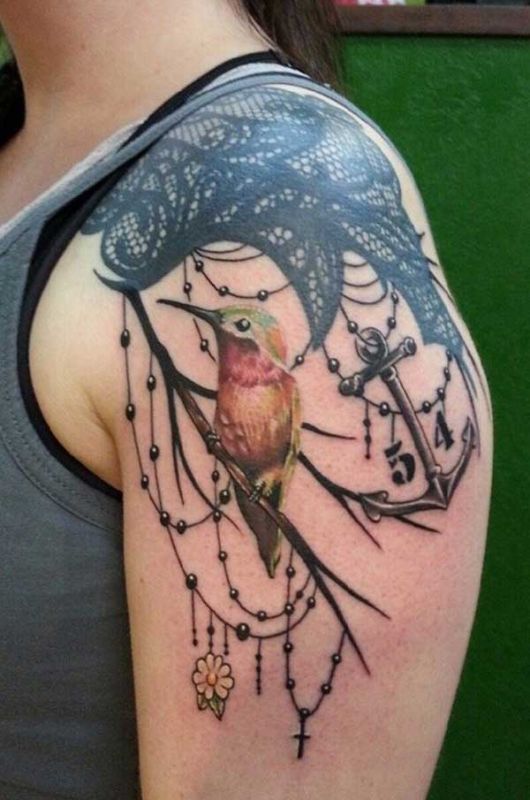 chest arm tattoo